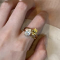 Women's open ring with geometric water drop shape and double sheng stone detailing on copper base