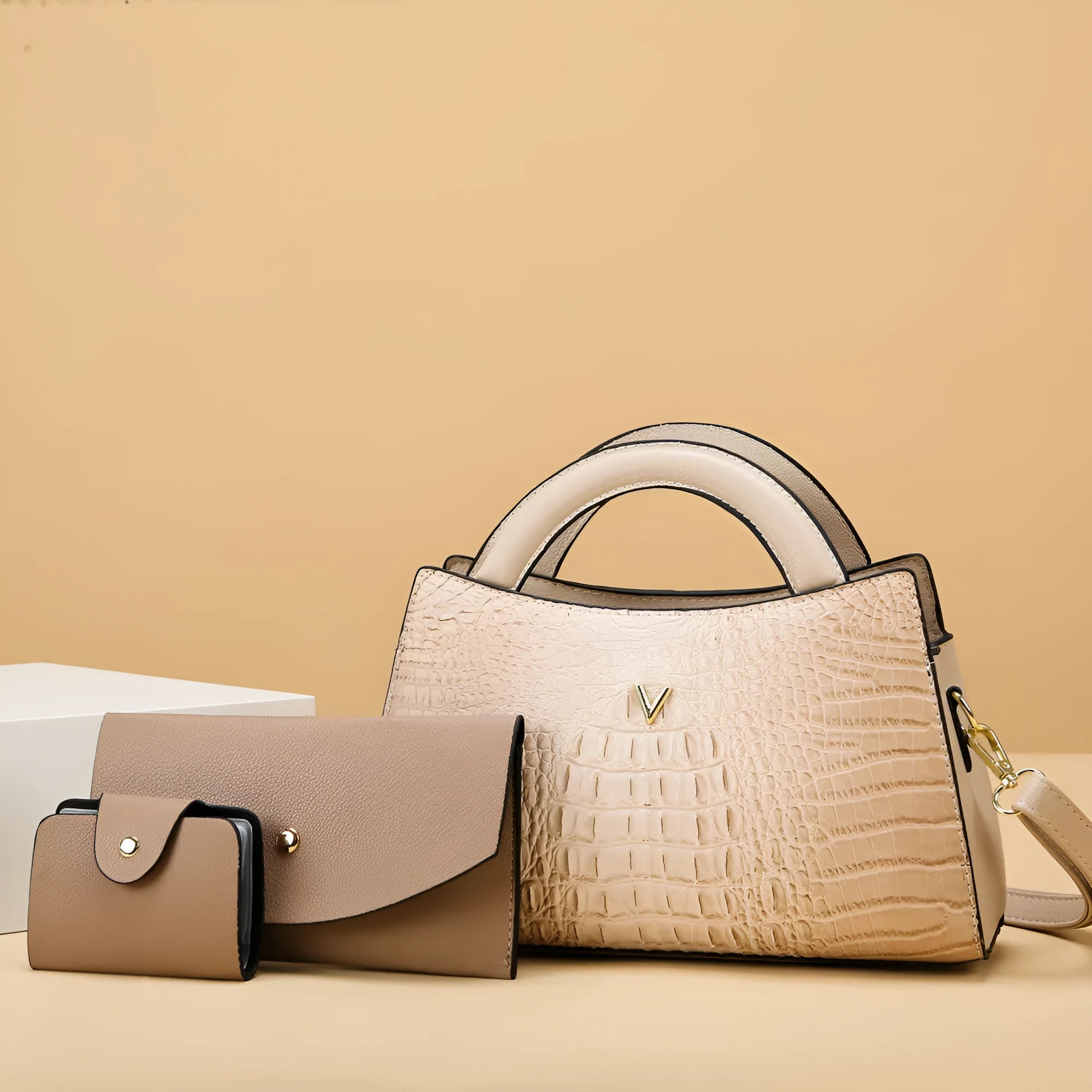 Women's black crocodile pattern crossbody handbag showing internal mobile phone and document compartments
