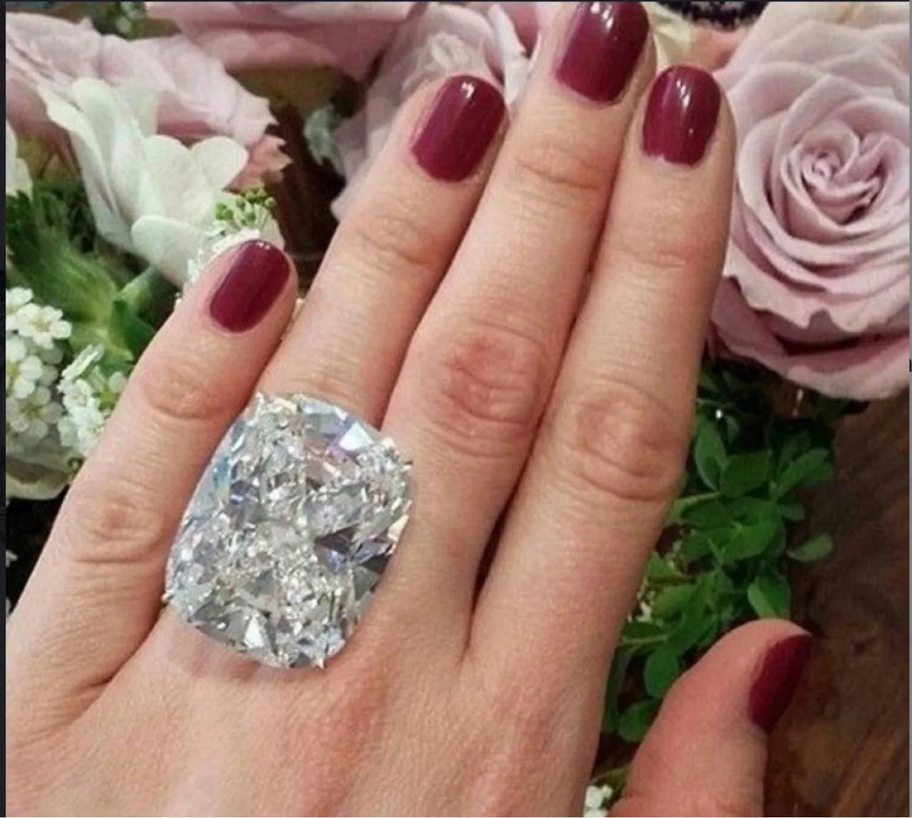 Women's alloy ring with electroplated white gold colour finish and geometric inlaid square diamond design