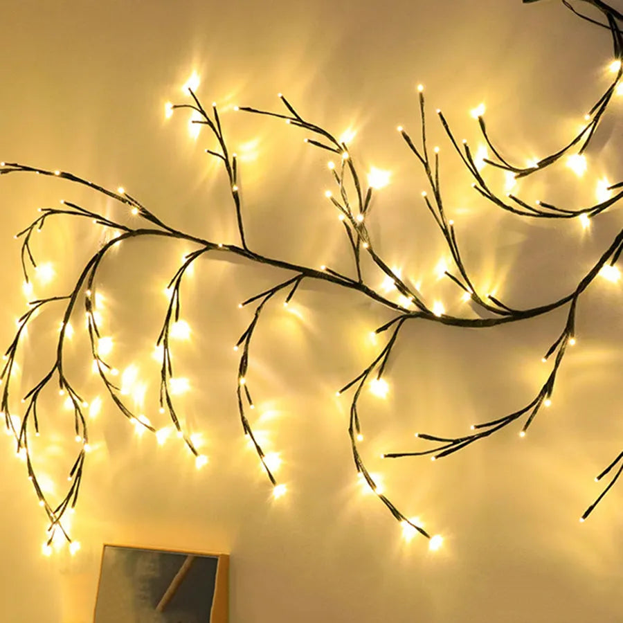 Flexible LED vine Christmas garland with birch bark texture and warm white lights for wall decor