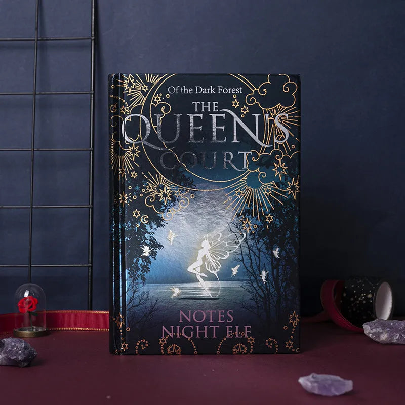 Blue and purple A5 hardcover luminous notebooks open to show full-colour illustrated pages