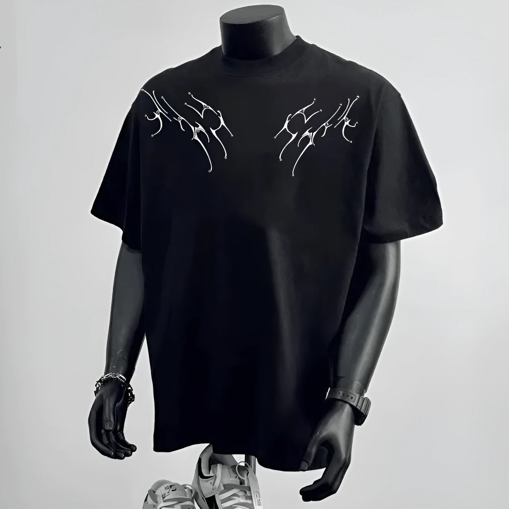 Men's black and white printed cotton t-shirt with loose fit design and short sleeves