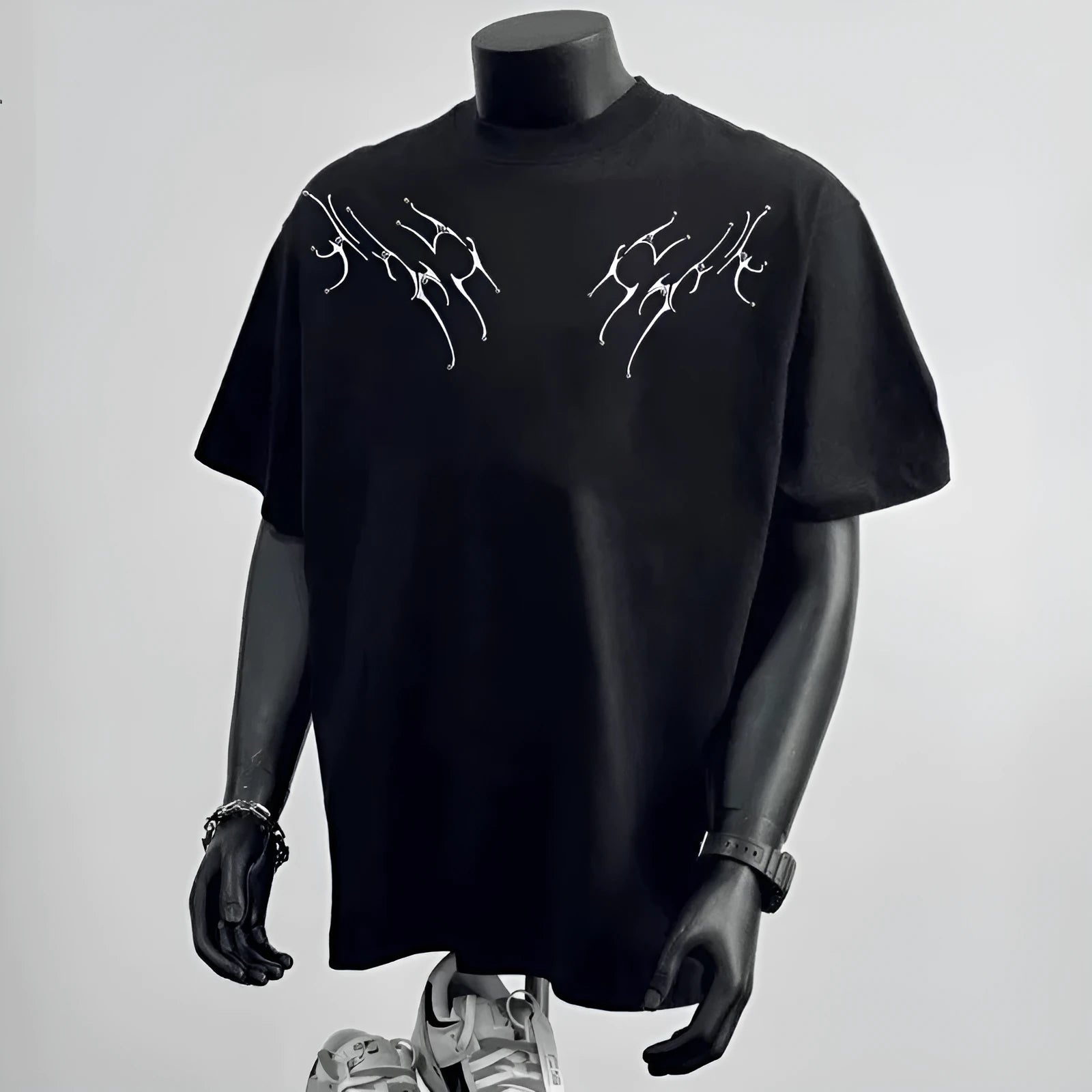 Men's black and white printed cotton t-shirt with loose fit design and short sleeves