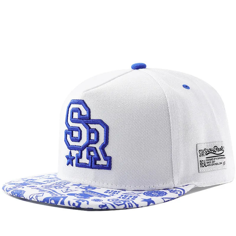 Cotton baseball cap with embroidered letters, adjustable strap, in black or white