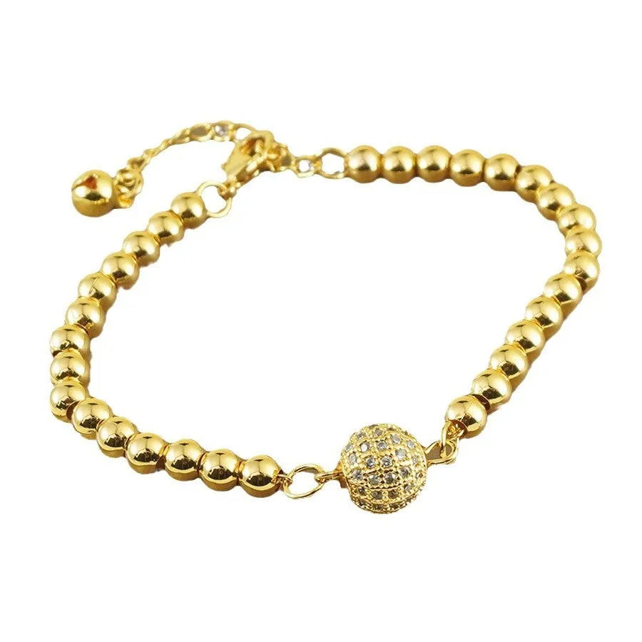 Women's copper bracelet with heart shape design, single ball zircon, and Arabic style elements