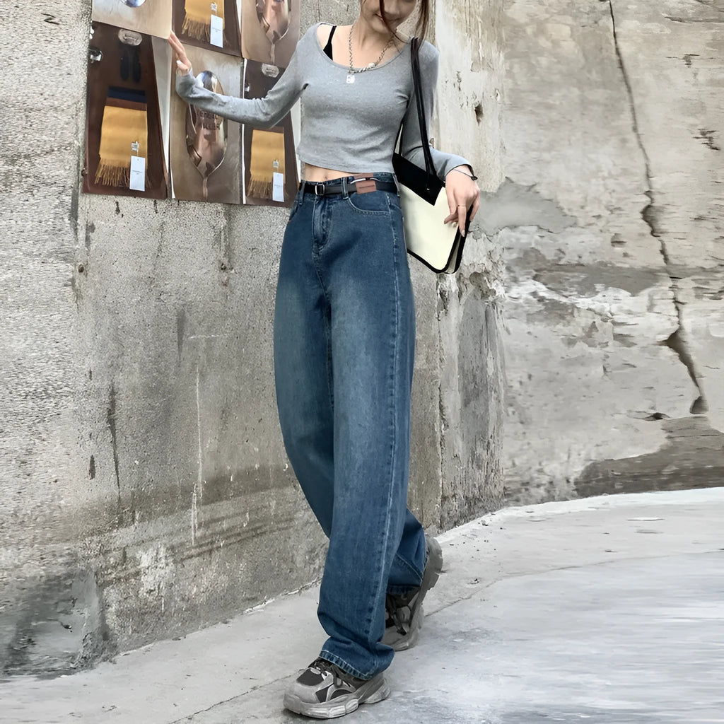 Women's retro blue high-waisted straight leg denim jeans on a neutral background.