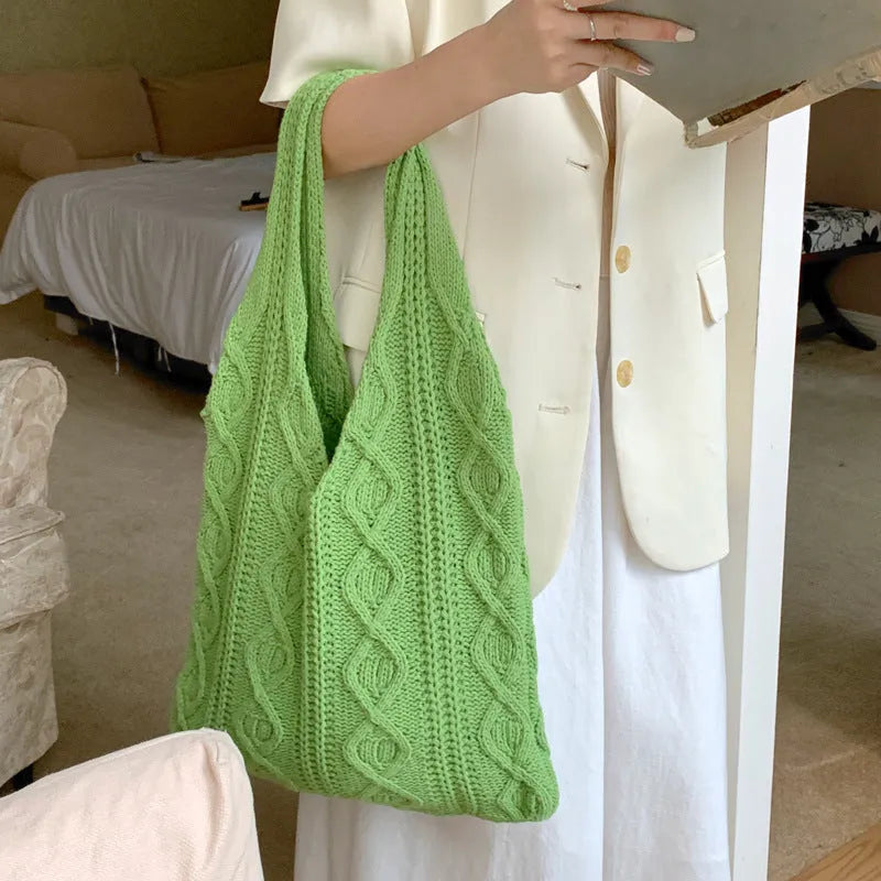 Large retro hollow knitted wool tote bag in a solid colour with double shoulder straps.
