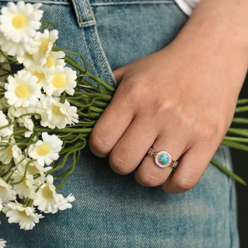 Women's turquoise ethnic style geometric copper ring with oil micro inlaid zircon in rose gold.