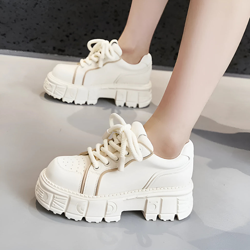 Women's beige leather casual shoes with viscose sole construction shown alongside pink version