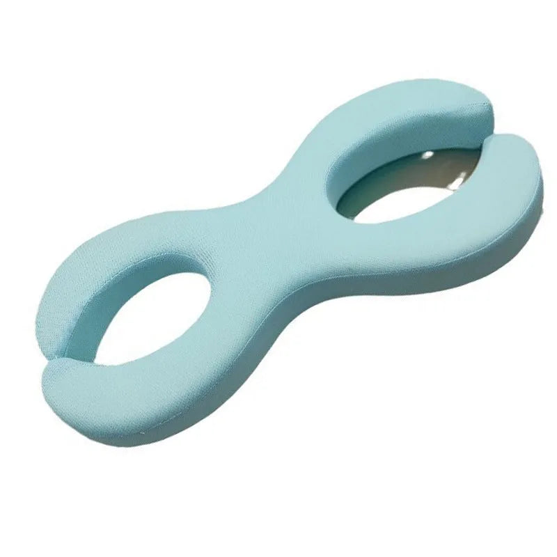 Cool blue cylindrical memory foam cervical pillow for neck support during sleep