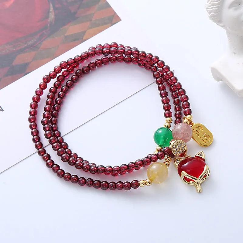 Purplish red garnet fox charm bracelet with adjustable rope for women