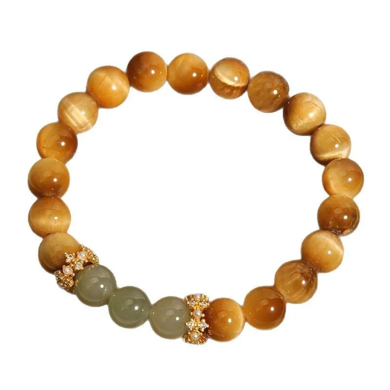 Natural yellow tiger's eye Hetian jade bracelet in u-shaped design with auspicious patterns.