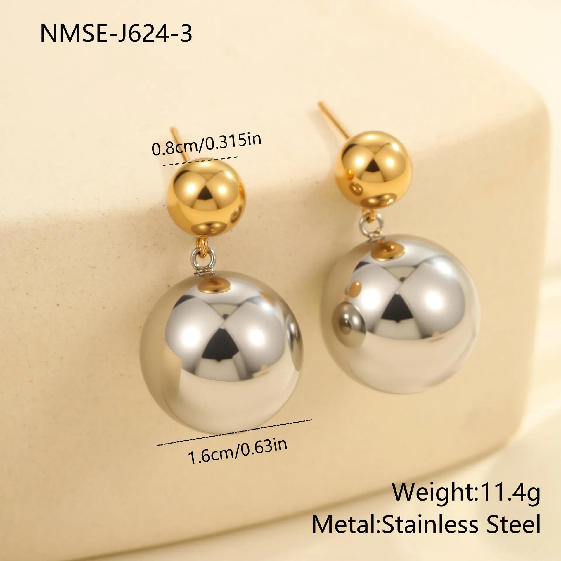Stainless steel geometric ear studs with round beads and colour-block electroplated finish.