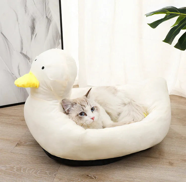 Blue duck-shaped pet bed sofa for small dogs and cats with fluffy polyester cushion