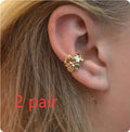 Gold starfish and scallop eardrop earrings with electroplated finish and conch details