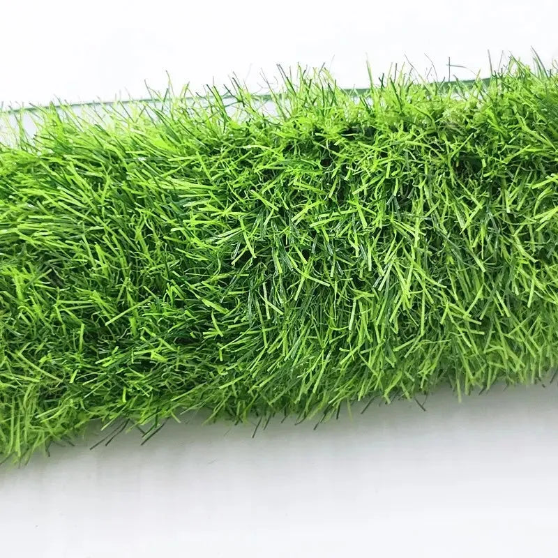 Artificial grass dog toilet training mat with drainage holes and rubber backing in three size options.