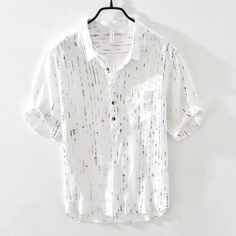 Men's loose fit short sleeve polo shirt in black, shown on a hanger.