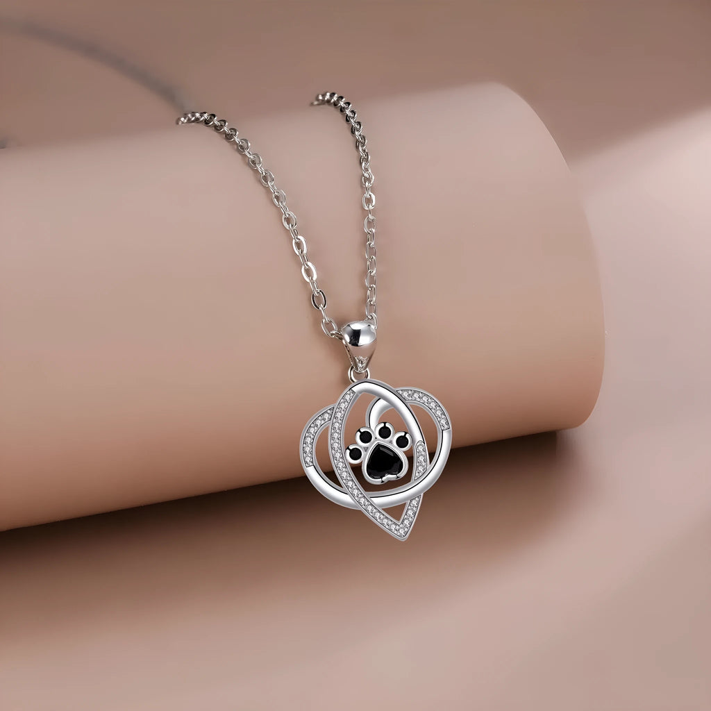 Copper necklace with dog and cat paw print pendant on cross chain