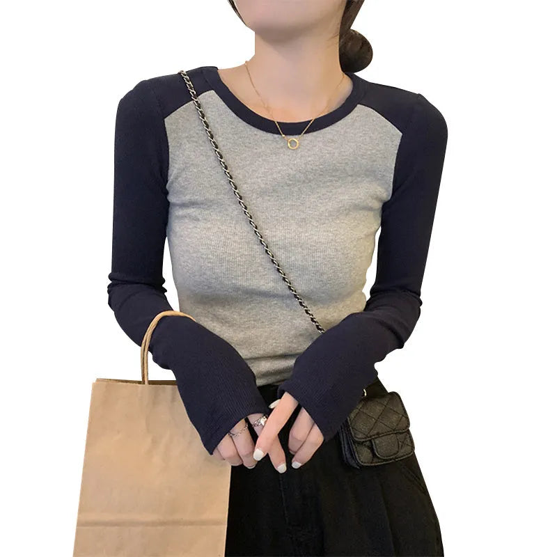 Women's oversized slim-fit casual top with long princess sleeves and embroidery detail in viscose fabric.
