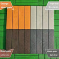 Plastic interlocking floor tiles in wood grain pattern showing 300x300mm dimensions and non-slip surface texture