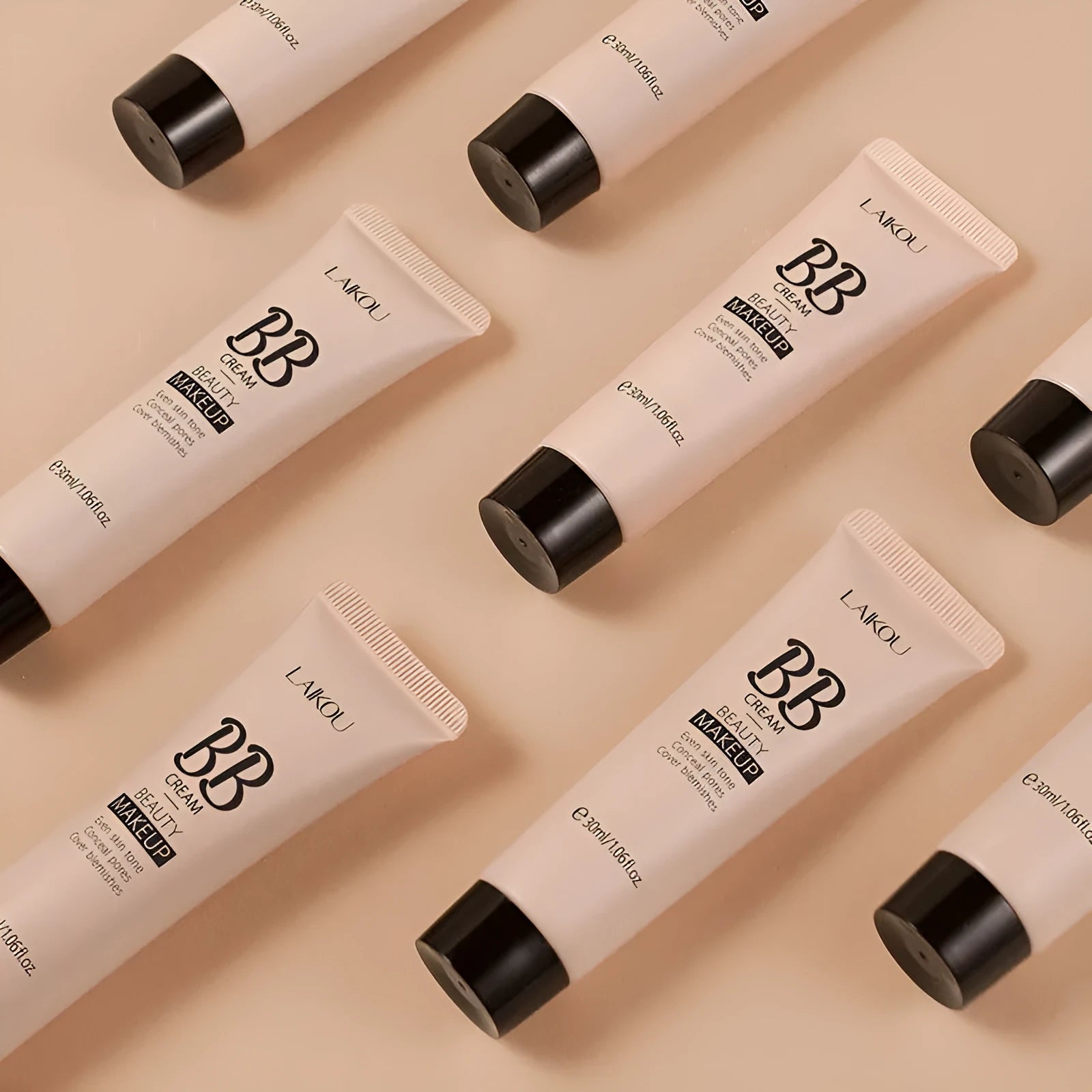 30ml tube of natural finish BB cream showing nine colour shade options from Ivory White to Brown