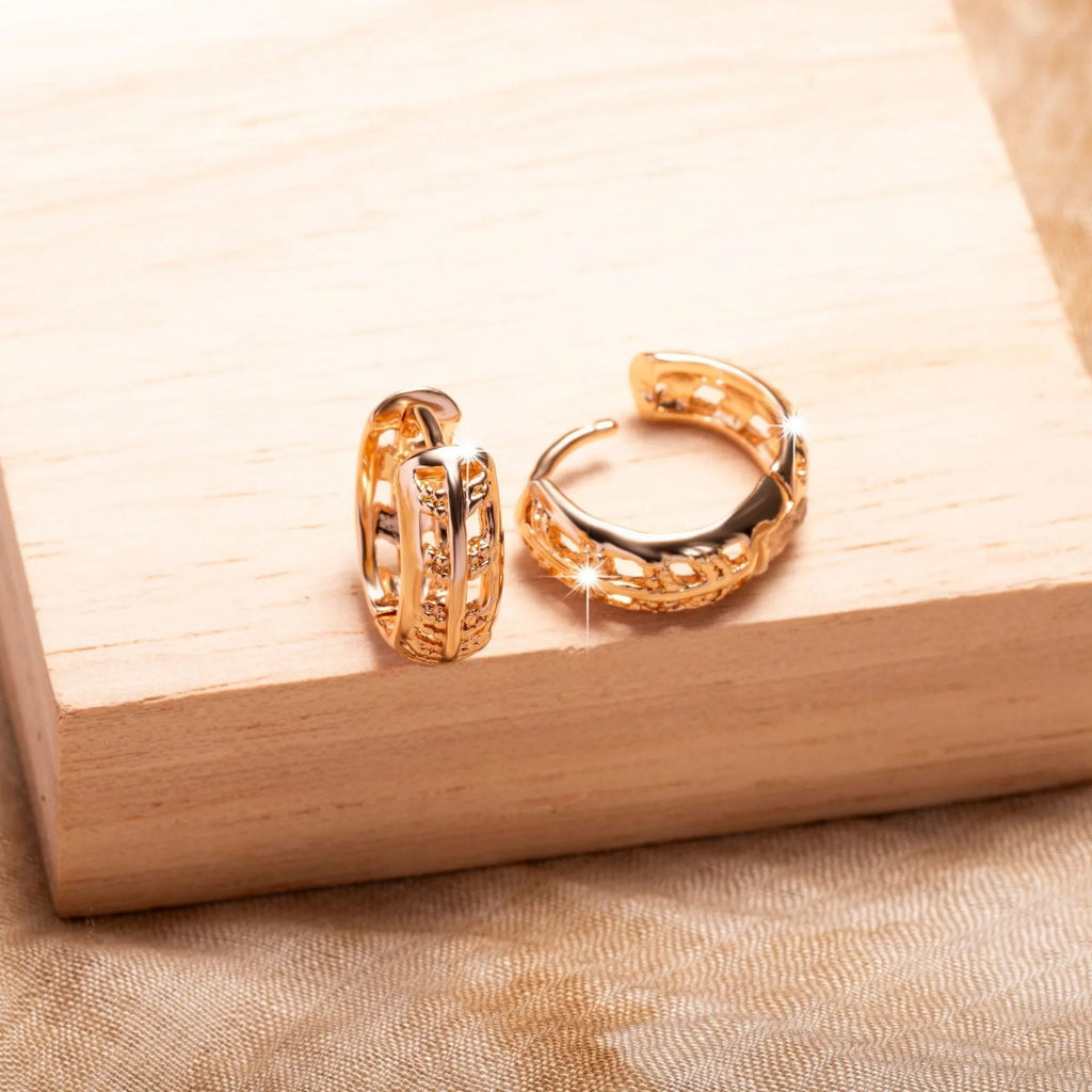 Small rose gold hollowed-out leaf and heart shaped copper earrings
