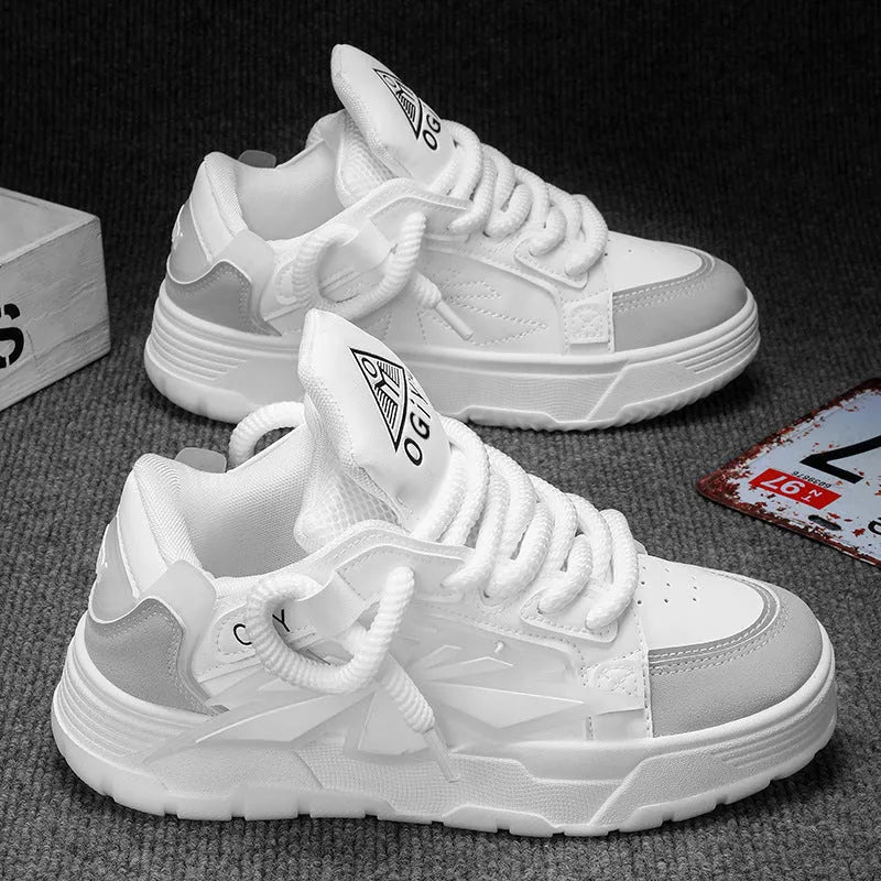 Men's white chunky low-top sneakers with round toe and lace-up front on rubber sole