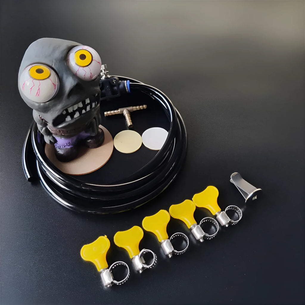 Turbo car blow-off valve explosive eye doll ornament kit with pressure valve and copper fittings.
