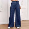 Plus size light blue washed wide-leg straight-leg jeans on a hanger.
