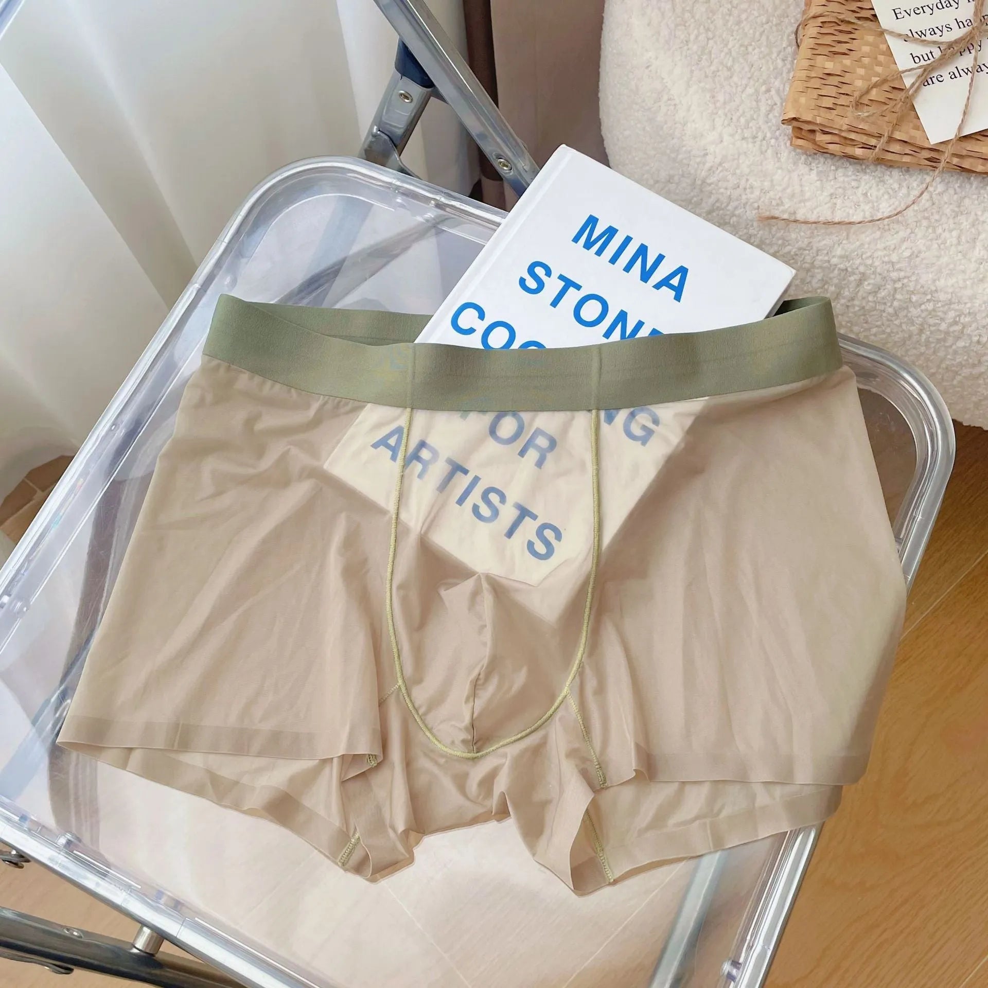 Men's thin seamless boxer shorts in light brown colour showing mid waist and quick-dry fabric