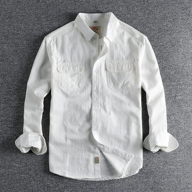 Men's solid colour cotton long sleeve shirt in British retro cardigan style, shown in light blue.