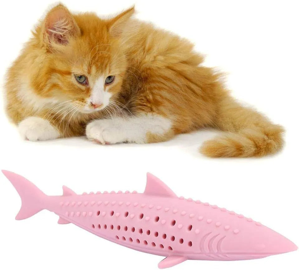 Green silicone fish-shaped cat chew toy with removable design showing breathable side holes