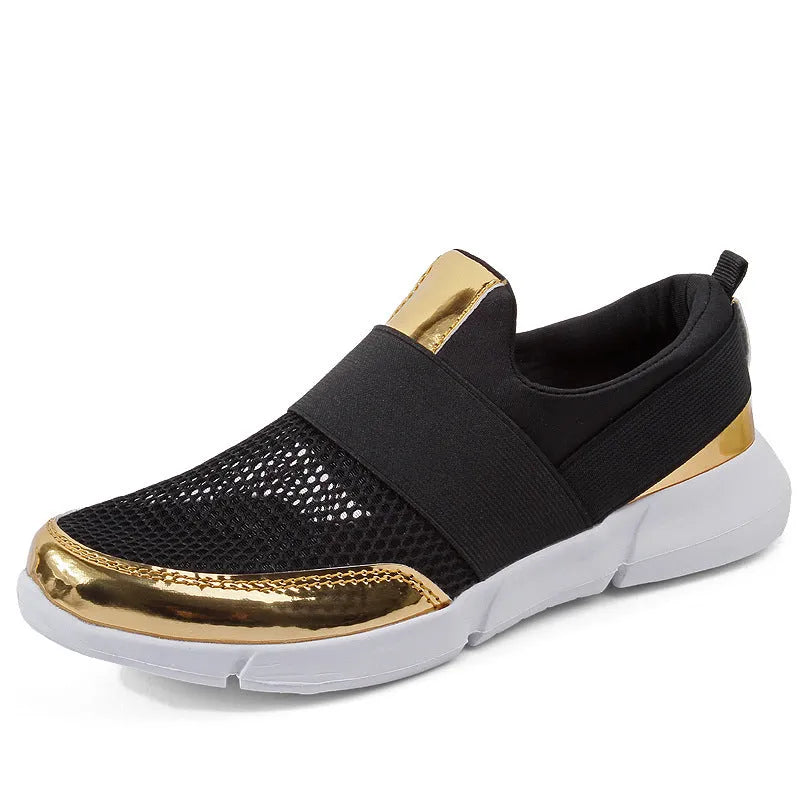 Women's low-top casual sneaker in grey with breathable mesh upper and lightweight sole.