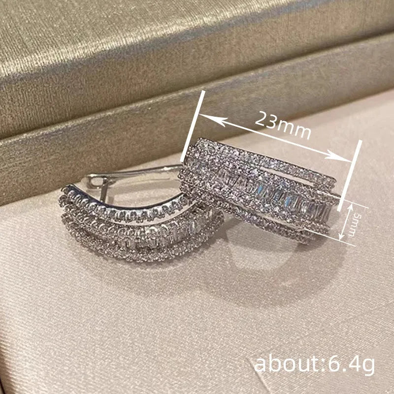 Geometric white gold colour stud earrings with zircon stone detail for women