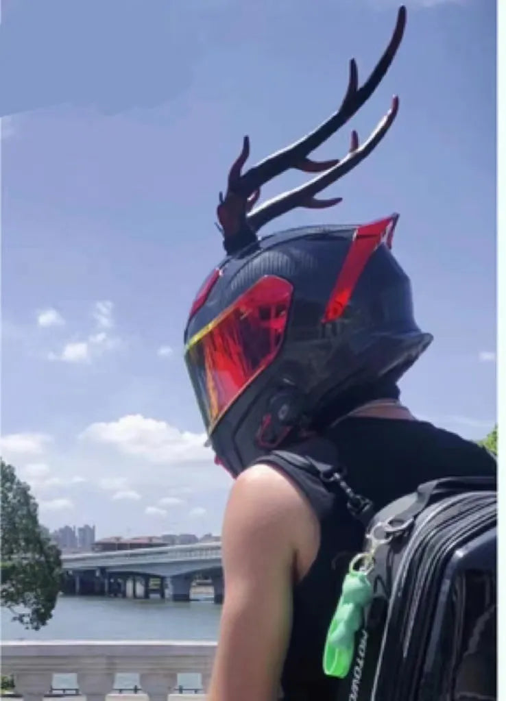 A pair of resin dragon horn decorations for helmet customisation, shown in black and red colour option.
