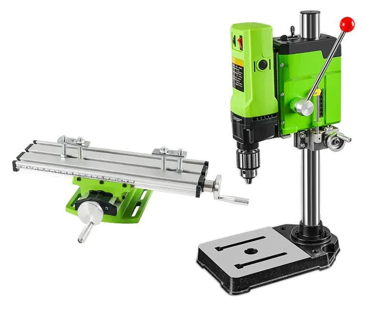 Mini bench drill and milling machine on a workbench with cross bench pliers and heavy duty pliers