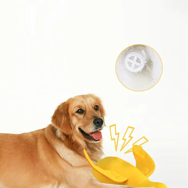 Yellow duck plush dog toy with a barking sound module for treat-dispensing play