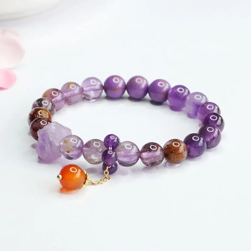 Natural nine purple amethyst and red agate Duobao crystal bracelet in Mori style, showing 8mm beads.