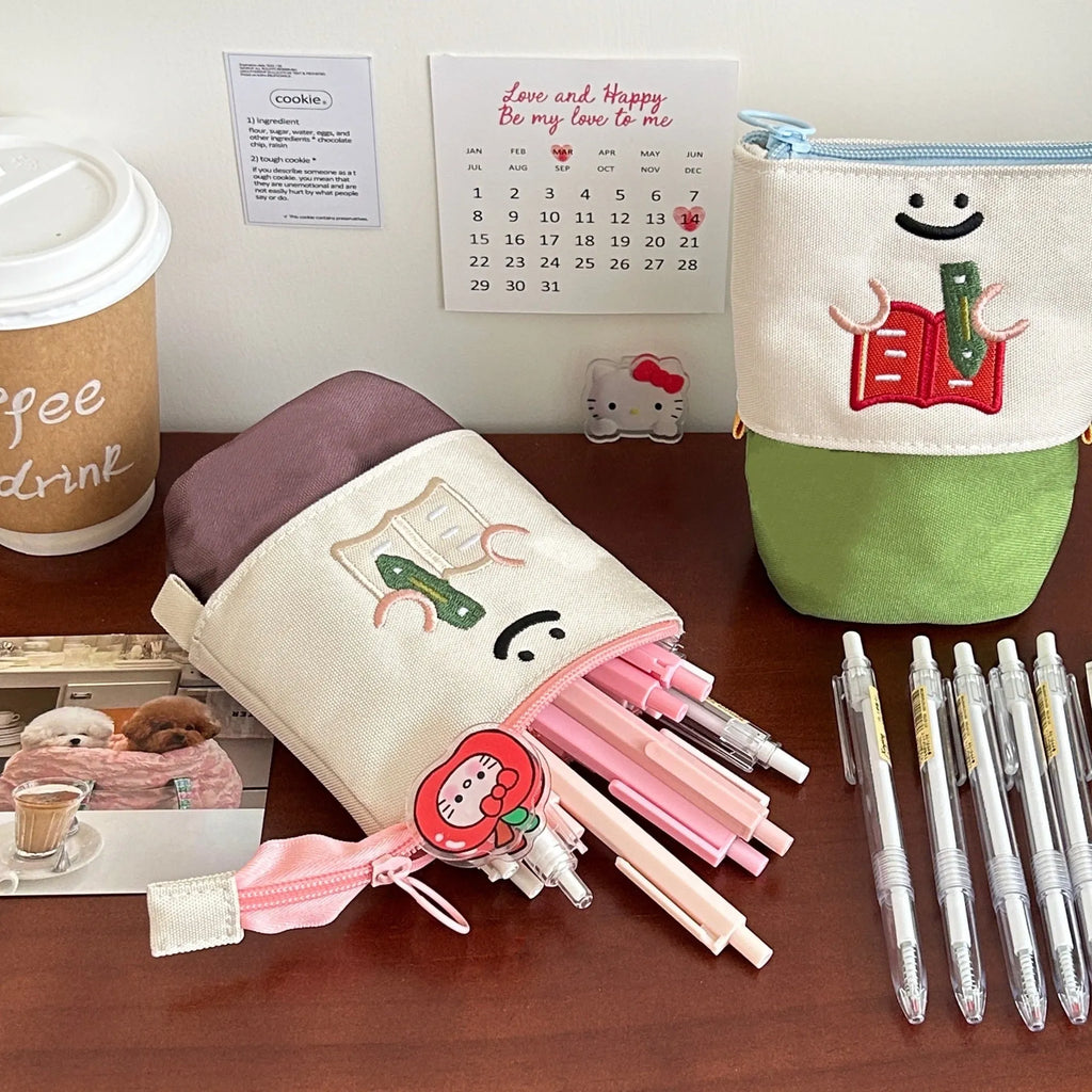 Korean style collapsible pencil case with cartoon design in Oxford fabric