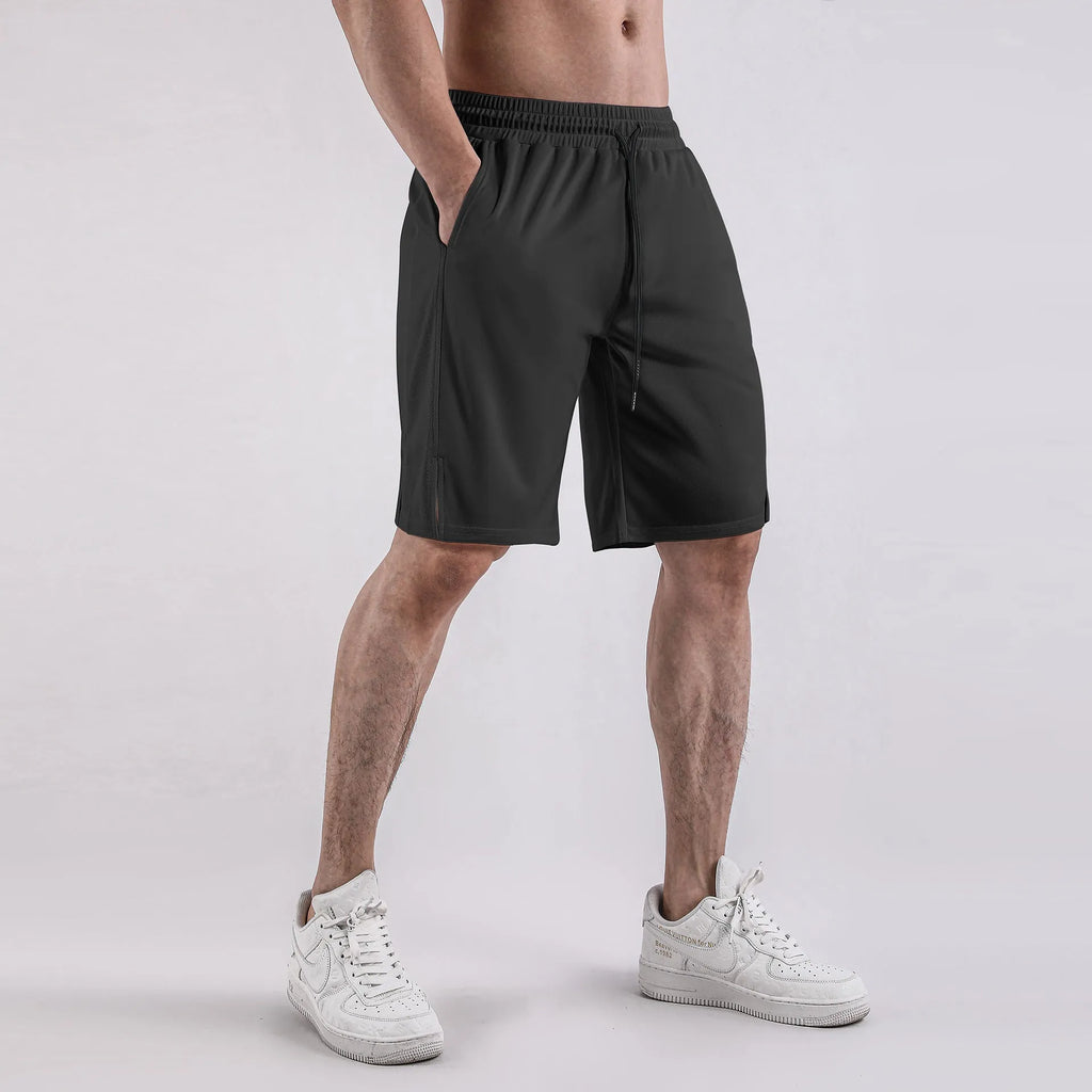 Men's black quick-drying mesh capri pants with elastic waistband and mid-length cut