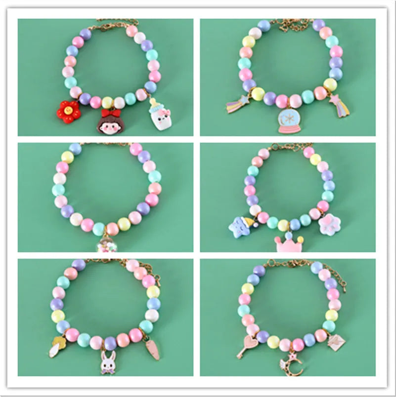 Colourful macaron-style resin pet headdress collar with adjustable sizing for cats and dogs, includes matching bracelet.
