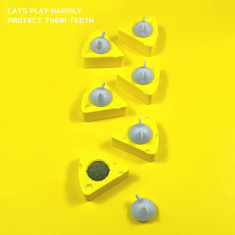 Yellow catnip and silvervine toy balls for cats to chew and play with