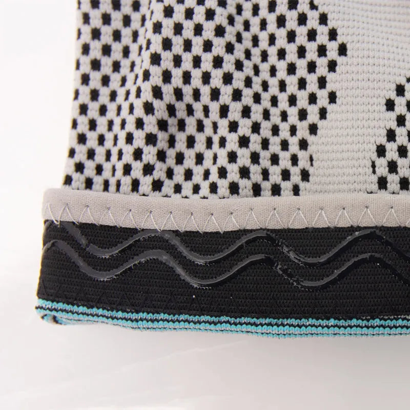 Sky blue silicone knee pad for sports on a neutral background
