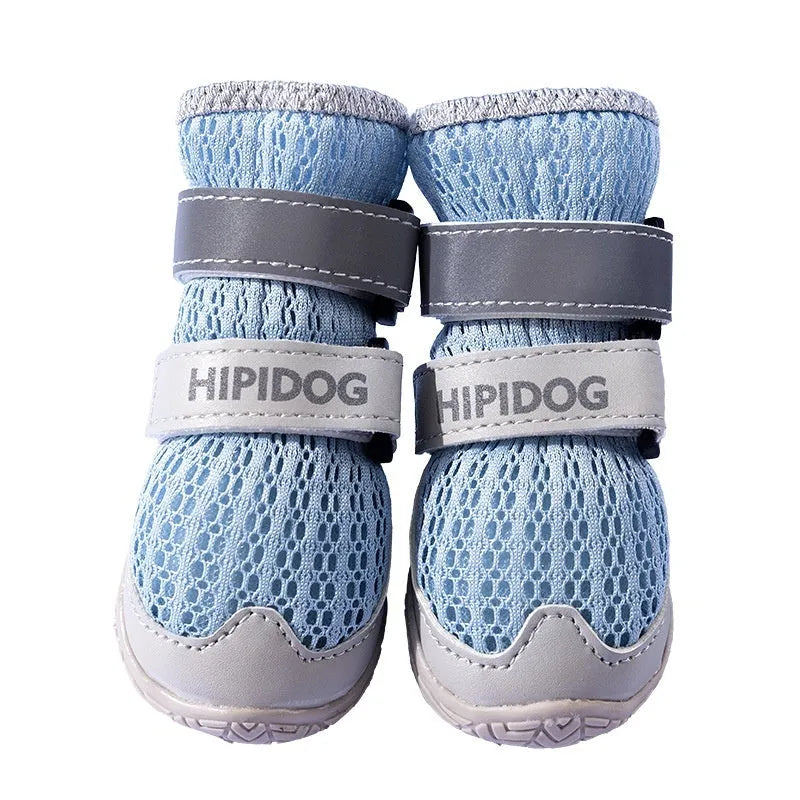 Pair of blue cartoon-style dog shoes made from PU material for summer paw protection.