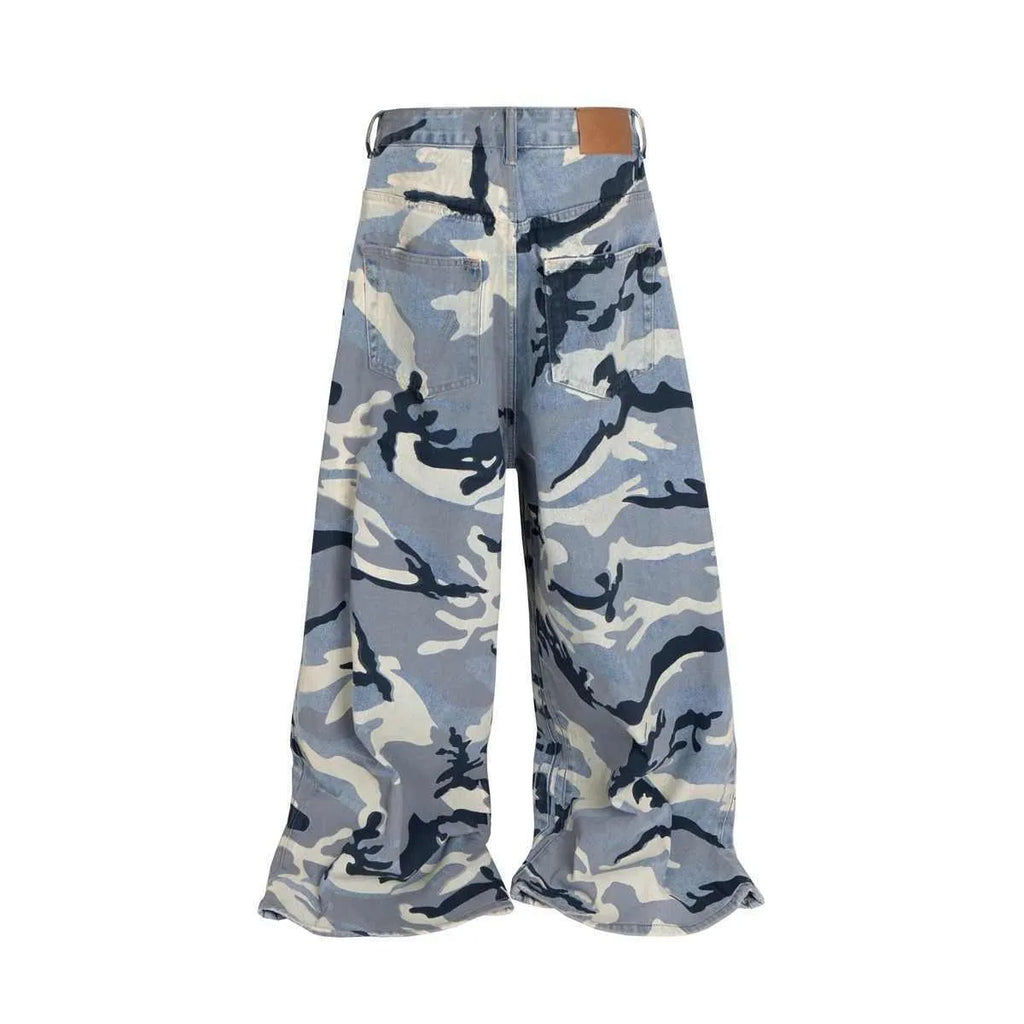 Snow camouflage blue loose fit jeans with mid waist on a plain background