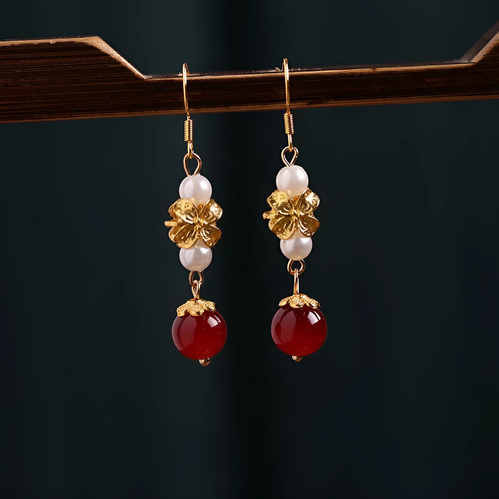 A pair of geometric retro-style alloy earrings with an electroplated finish, designed with vintage court and Han cheongsam inspiration.