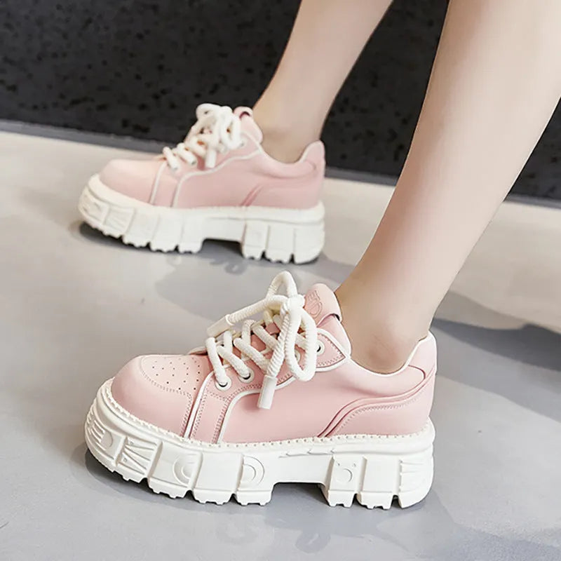 Women's beige leather casual shoes with viscose sole construction shown alongside pink version