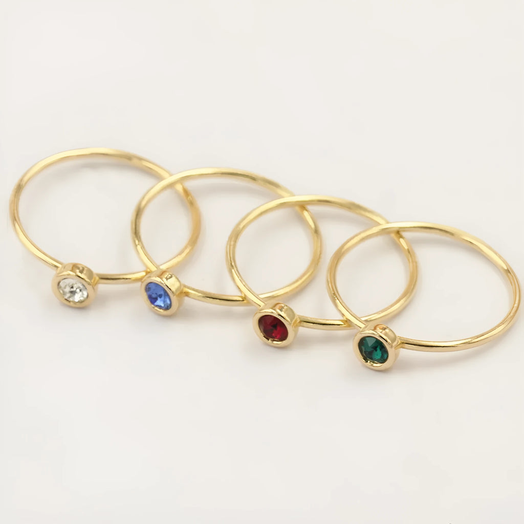 14K gilded GF zircon knuckle ring in green, blue, dark red, or white on a copper base.