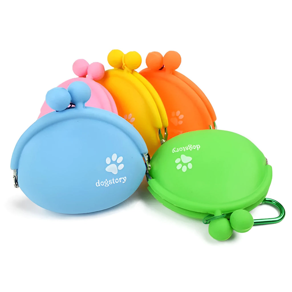 Yellow silicone dog training treat pouch with hook-and-loop strap, shown attached to a waistband.