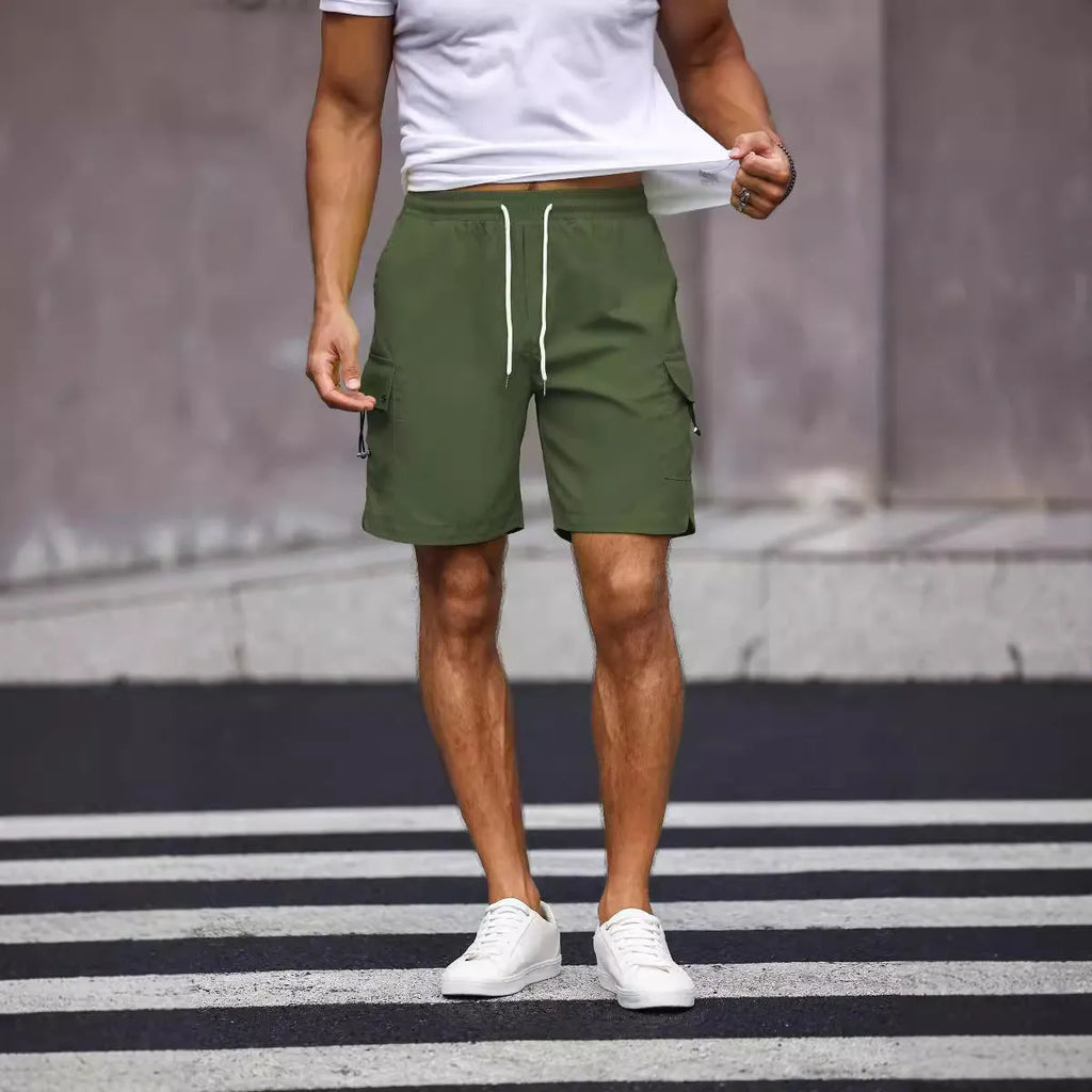 Men's loose fit work shorts in army green with straight leg design and fifth pants length